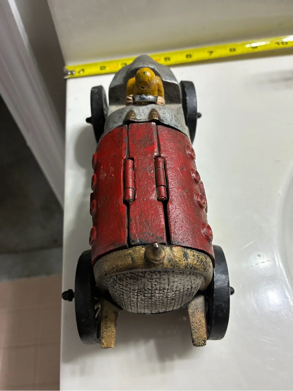 Vintage -style decorative cast iron race car modeled after Hubley racers